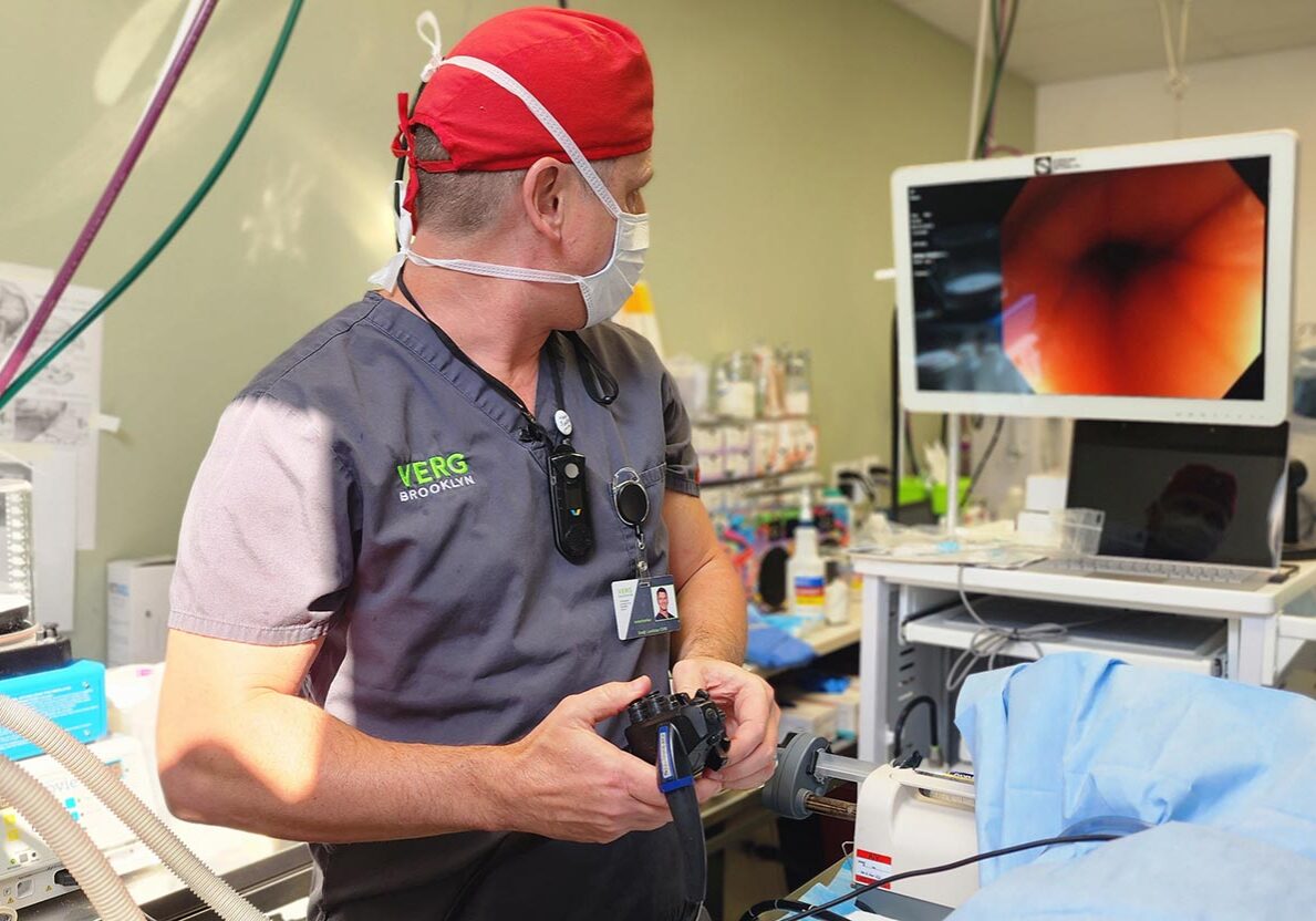 Dr. Brett diagnosing with endoscopy